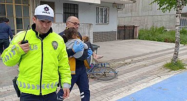 Bursa'da 1. kattan düşen çocuğu moloz dolu çuvallar korudu