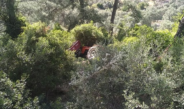 Kontrolden çıkan traktör ormanlık alana devrildi: 2 yaralı