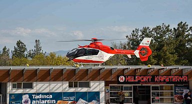 Baygın haldeki genç kızın yardımına ambulans helikopter yetişti