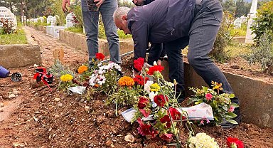 Saldırıda hayatını kaybeden Kerem'in mezarına çiçekler dikildi