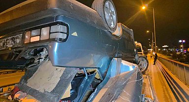 Takla atan otomobilden burunları bile kanamadan çıktılar