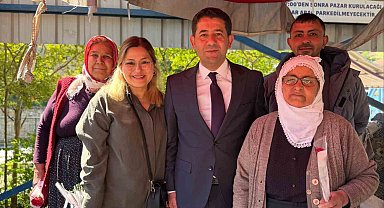 Feke'de kadın pazarcılara Anneler Günü hediyesi başkandan
