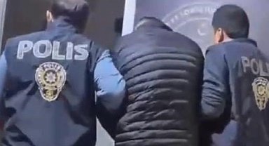 İzmir'de 50 yıl hapis cezasıyla aranan şüpheli gardıropta yakalandı