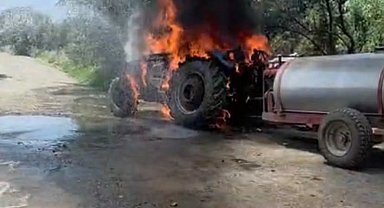 Alevlere teslim olan traktörde yaşanan patlama kameraya yansıdı