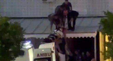 Cam silerken metrelerce yükseklikten düşen genç kız yaralandı