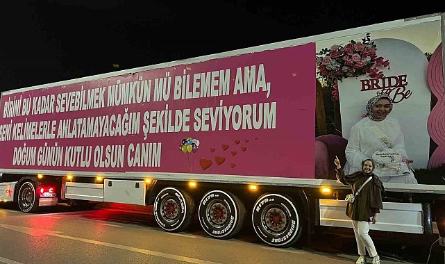 Eşinin doğum günü için 25 metrelik tırı kapladı