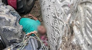 Kullandığı traktörün altında kalan çiftçi ağır yaralandı