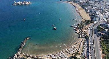 Sıcaklar geldi, okullar tatil olmadan sahillerde yoğunluk başladı