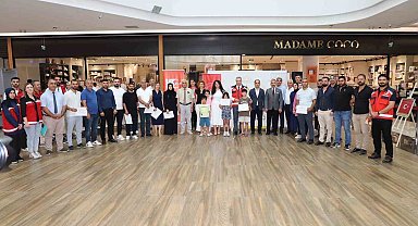 Adıyaman'da şehit yakınları ve gazilerin ebru sergisi açıldı