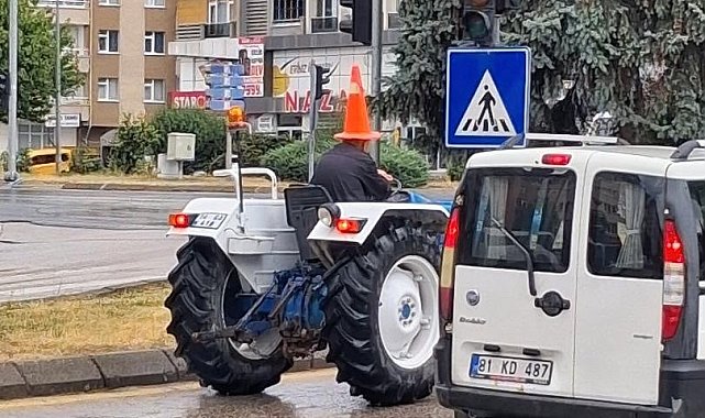 Bolu'da traktör sürücüsünden yağmura karşı 'dubalı' önlem