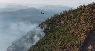 Fethiye'de ekiplerin orman yangını ile ilgili mücadelesi sürüyor