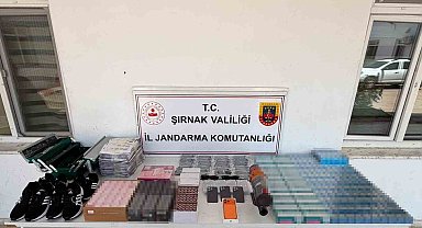 Şırnak'ta kaçakçılık operasyonu: Silah, sigara ve milyonluk kaçak ürün ele geçirildi