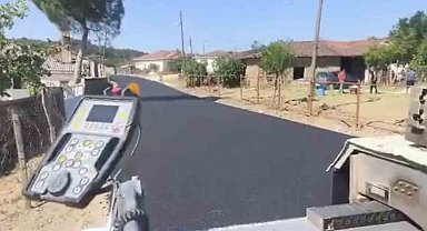 Yenice'de köy yollarında sıcak asfalt dökme çalışmaları hız kesmeden devam ediyor